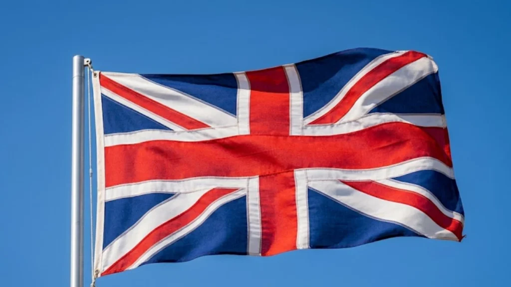 a union jack flying in the wind buy from farmers direct.