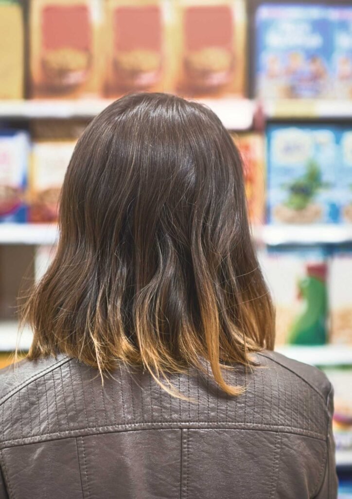 A woman choosing what to purchase