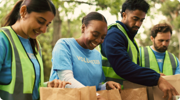 Volunteers packing food together for a community project