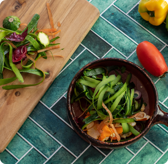 Fresh vegetables being prepared on a chopping board