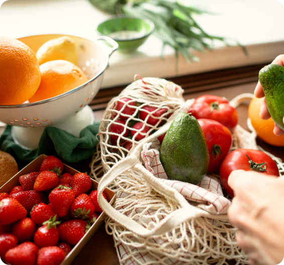 Reusable shopping bag filled with fresh vegetables