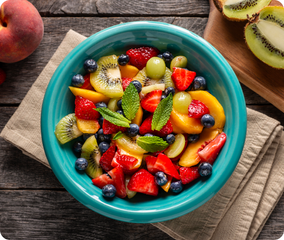 Colourful fresh salad in a blue bowl