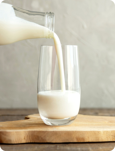 Milk being poured into a glass