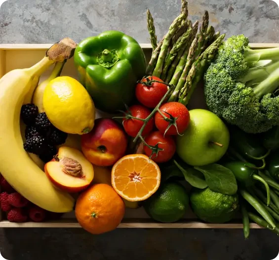 Wooden crate filled with fruit and vegetables