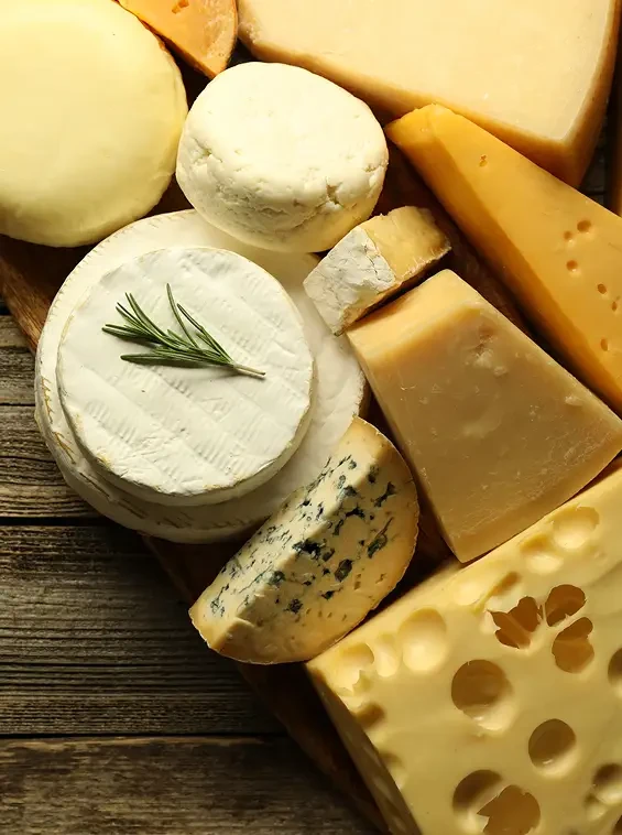 A selection of soft, blue and hard cheeses