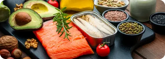 Fish, avocado, nuts and seeds arranged together