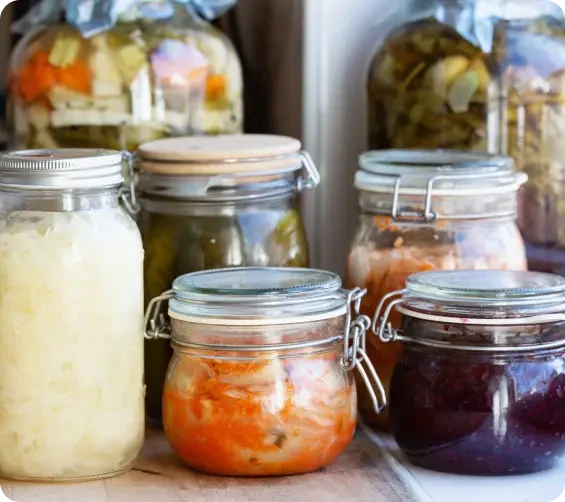 Several jars of shredded and pickled vegetables