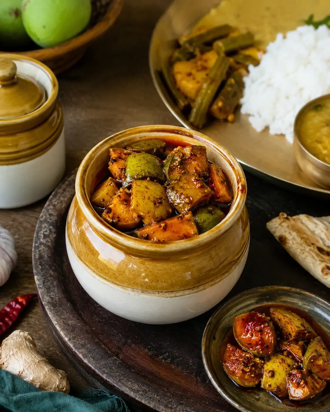 Spiced mixed vegetable pickle in small ceramic pots